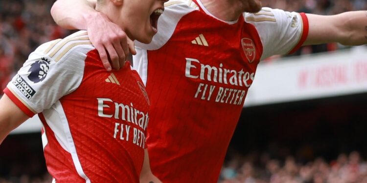 Focused Arsenal swat Bournemouth to keep up title hopes