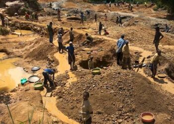 The Federal Government has pledged to seek justice for the 12 miners who were brutally killed by bandits in Unguwar Magro Village, located in the Shiroro Local Government Area of Niger State. This tragic incident has shocked the nation, drawing attention to the urgent need for enhanced security measures in areas affected by mining activities. Dele Alake, the Minister of Solid Minerals Development, made a statement today expressing profound sorrow over the loss of the miners. He confirmed that security agencies are actively working to track down those responsible for this heinous act and promised that they will be brought to justice. "We are committed to ensuring that those who committed this atrocity will face the full force of the law," Alake said. In response to the attack, the government has decided to suspend all mining operations at the site until a thorough investigation is completed. This measure is intended to ensure that no further incidents occur while authorities are working to secure the area and gather crucial information. Alake highlighted that the Mining Marshals, along with intelligence units and other security agencies, are intensifying their efforts to locate the bandits. These criminal elements are believed to have crossed into Niger State from neighboring regions, making the operation to track them down even more challenging. The Minister noted that this attack has been categorized as a special case, leading to a coordinated response from various agencies to uncover the bandits' activities and dismantle their operations. The fight against banditry, particularly in the mining sector, is a high priority for the current administration. Alake emphasized, "There is a new Sheriff in town, and combating banditry in the mining sector is a mandate we are taking seriously. Those who think they can invade villages and kill innocent people to pave the way for illegal mining will be in for a rude awakening. We will not tolerate such lawlessness." Furthermore, Alake revealed that preliminary reports suggest the involvement of non-Nigerians in funding these illegal mining operations. He warned that anyone found guilty of supporting or participating in these activities would be prosecuted for economic sabotage and waging war against the Nigerian state. This includes individuals and entities from other countries, underscoring the government's commitment to addressing this issue on an international scale. The Minister also urged foreign embassies in Nigeria to monitor the activities of their nationals in the mining sector carefully. He warned that any involvement in criminal conduct by foreigners could negatively impact diplomatic relations between Nigeria and their home countries. In a recent event on the sidelines of the United Nations General Assembly, Alake revealed that Nigeria's mineral resources are currently valued at over $700 billion. He highlighted the potential for further discoveries and Nigeria's readiness to meet the increasing global demand for these vital resources. The Minister's remarks underscored the importance of securing the mining sector to ensure its continued growth and contribution to the national economy.